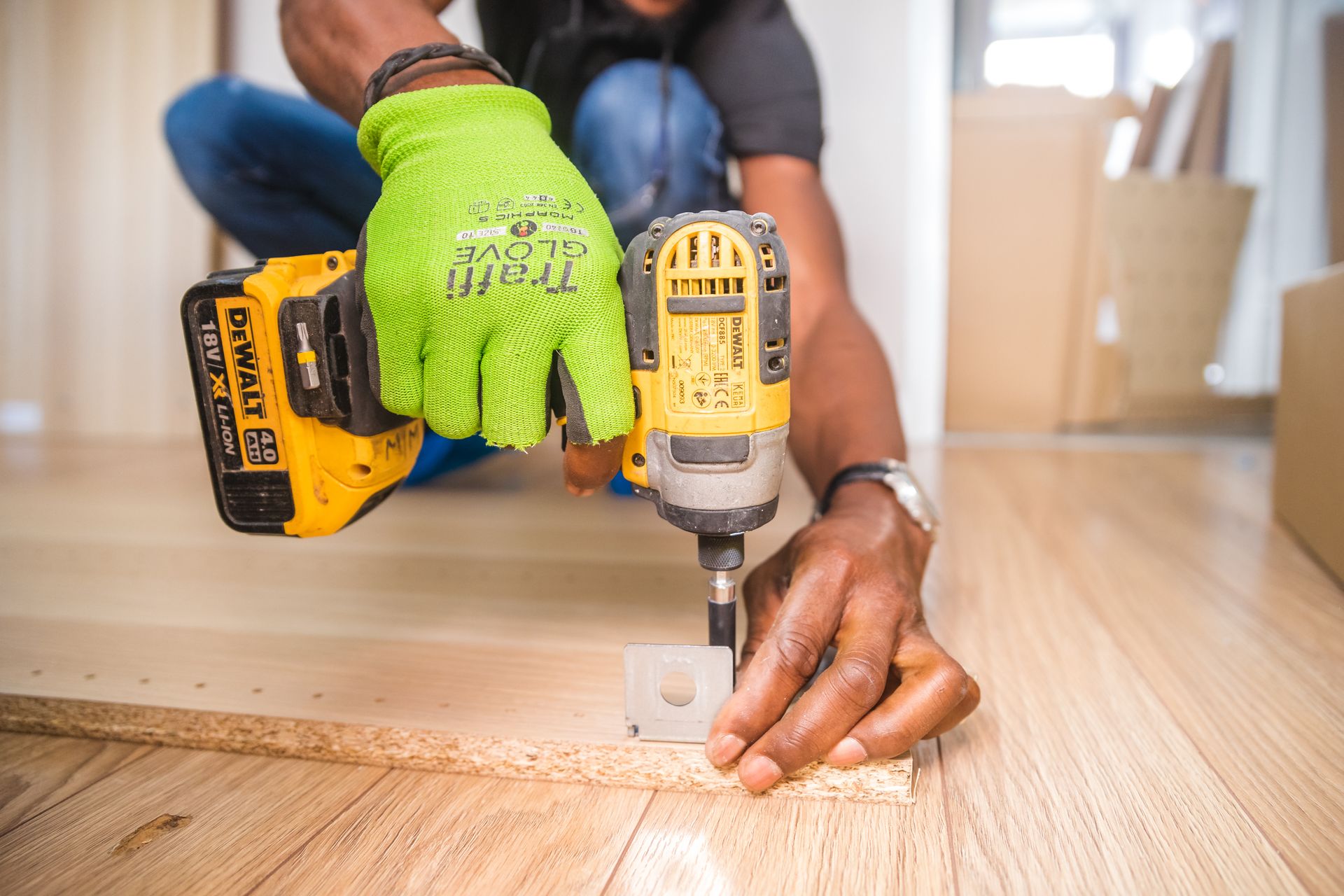 Cordless power drill on a workbench, representing power tools and cutting supplies